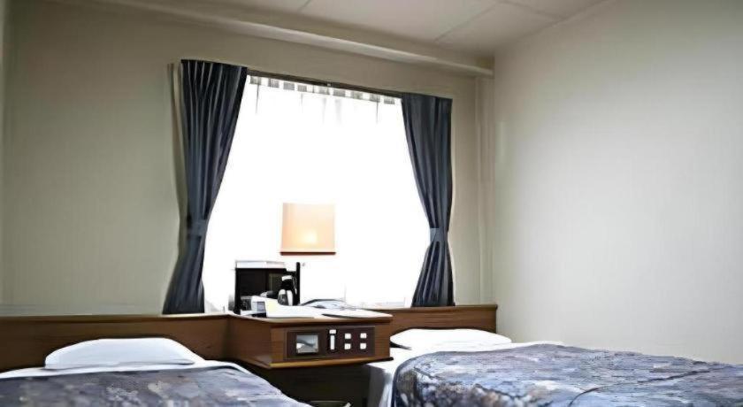 Kochi Business Hotel Bekkan Екстериор снимка